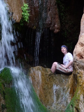 The author, prior to jumping the waterfall into the clear pools below.